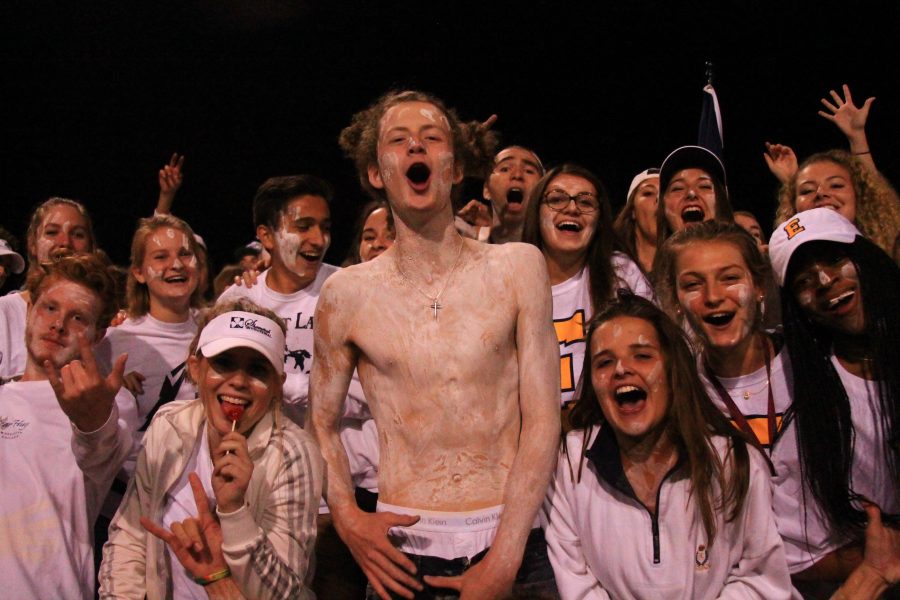 Student section leader Jack Gabridge 17 rallies after touchdown against Wyoming. 