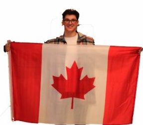 Elliot Jung 18 holds the Canadian flag to represent his dual citizenship. He is of several students who have two citizenships.