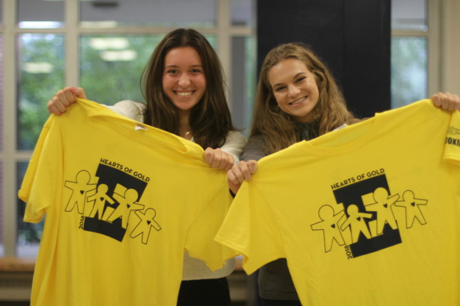 Volunteers sold Hearts of Gold T-shirts during lunch.