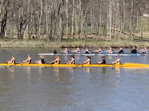 The crew team working hard on Reeds Lake.