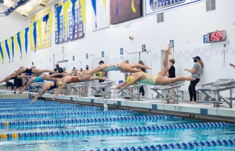 Girls Swim lead an undefeated season