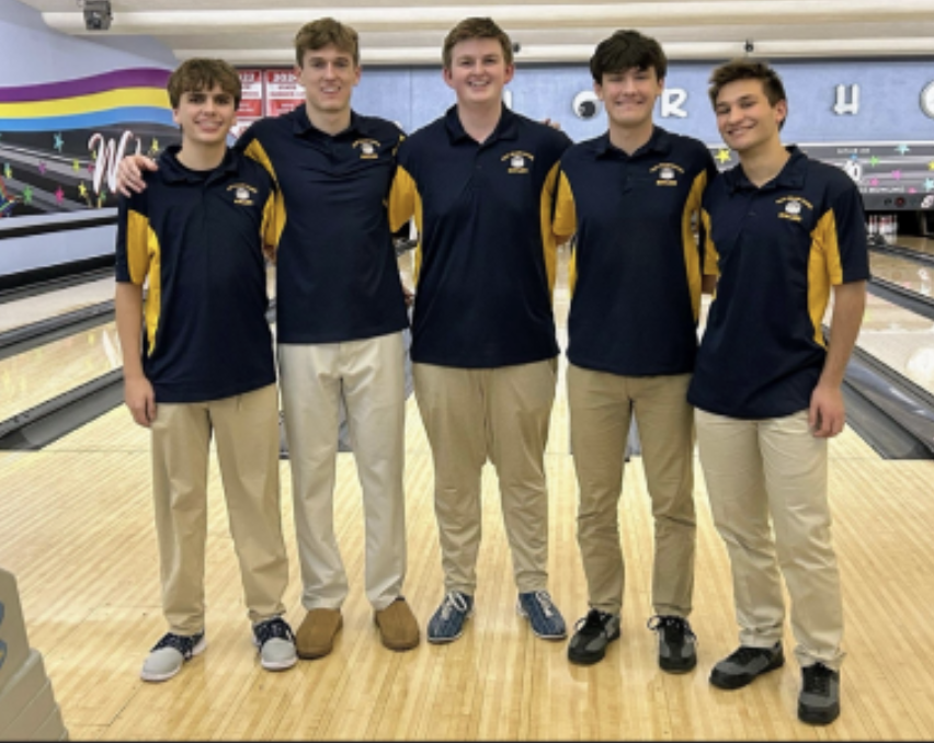 The seniors after taking the win against Forest Hills Eastern on Jan. 7.